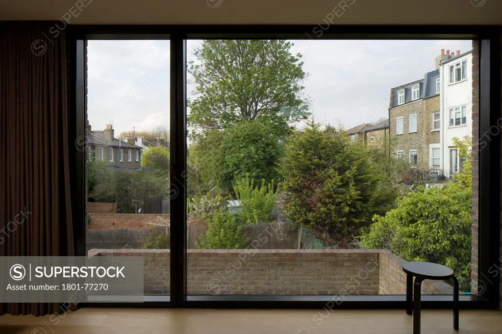 KINGS'S GROVE, London, United Kingdom. Architect: Duggan Morris Architects Ltd, 2010. Upstairs office with view over gardens.