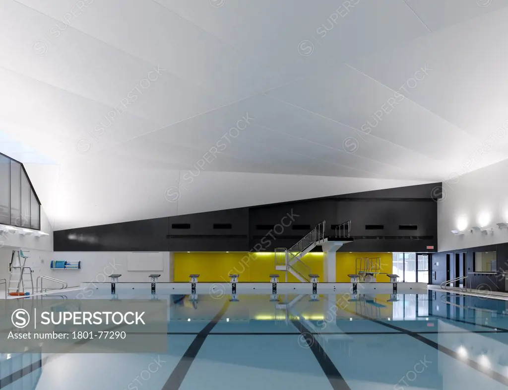 Centre Aquatique, St Hyacinthe, St Hyacinthe, Canada. Architect: Architecture, 2012. Main competition pool, diving boards.