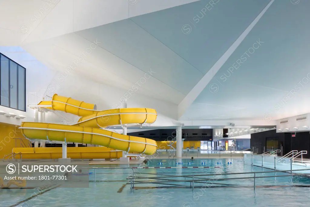 Centre Aquatique, St Hyacinthe, St Hyacinthe, Canada. Architect: Architecture, 2012. View of leisure pool with water slide.