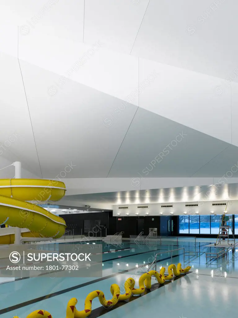 Centre Aquatique, St Hyacinthe, St Hyacinthe, Canada. Architect: Architecture, 2012. View of leisure pool with water slide.