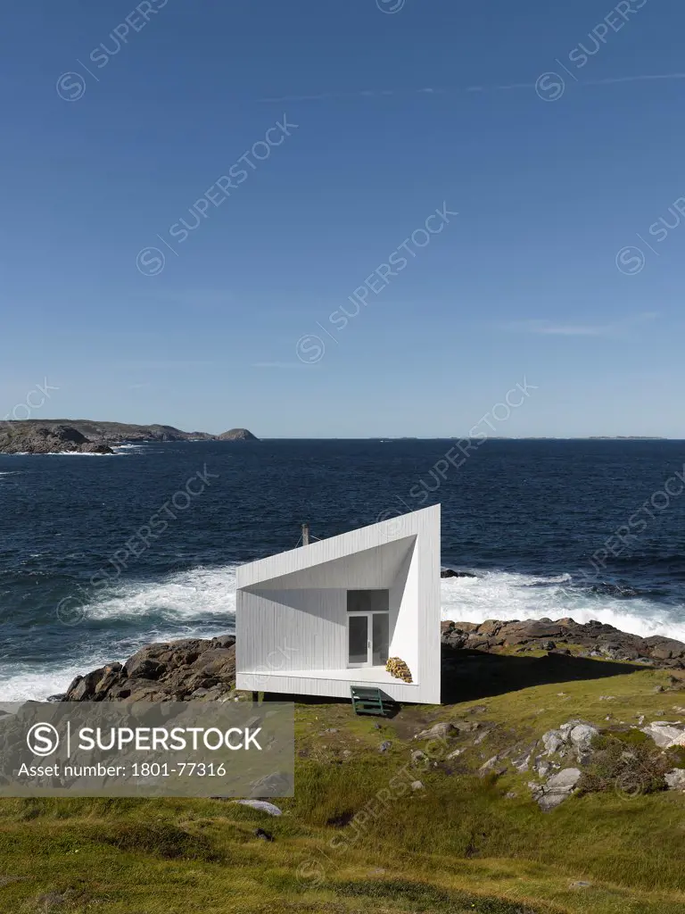 Squish Studio, Fogo Island, Canada. Architect: Todd Saunders, 2011. View from hill.