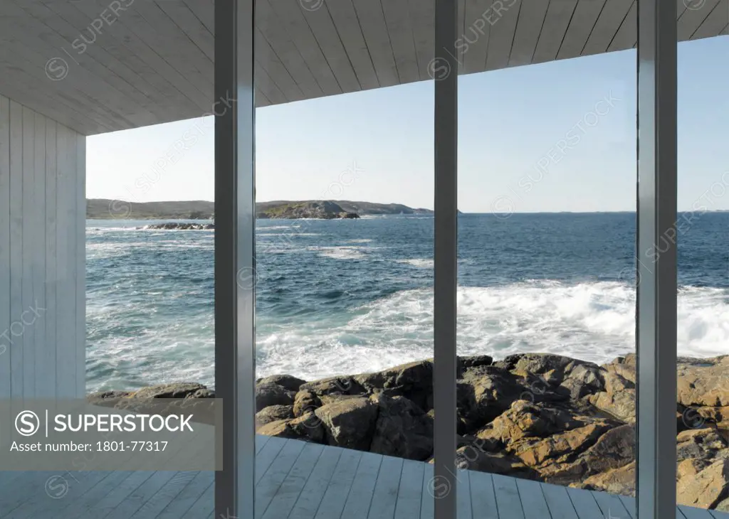 Squish Studio, Fogo Island, Canada. Architect: Todd Saunders, 2011. View onto ocean from inside.