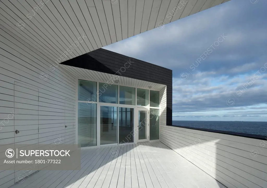 Long Studio, Fogo Island, Canada. Architect: Todd Saunders, 2011. View of main door from studio terrace.