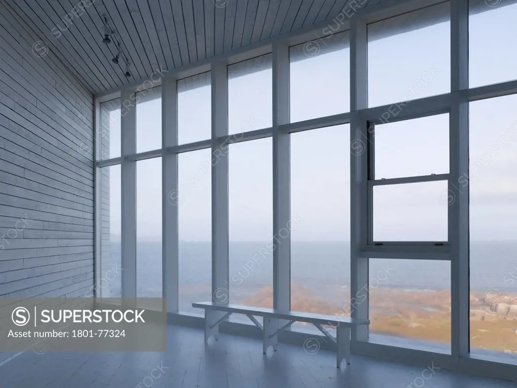 Long Studio, Fogo Island, Canada. Architect: Todd Saunders, 2011. Interior view out over ocean.