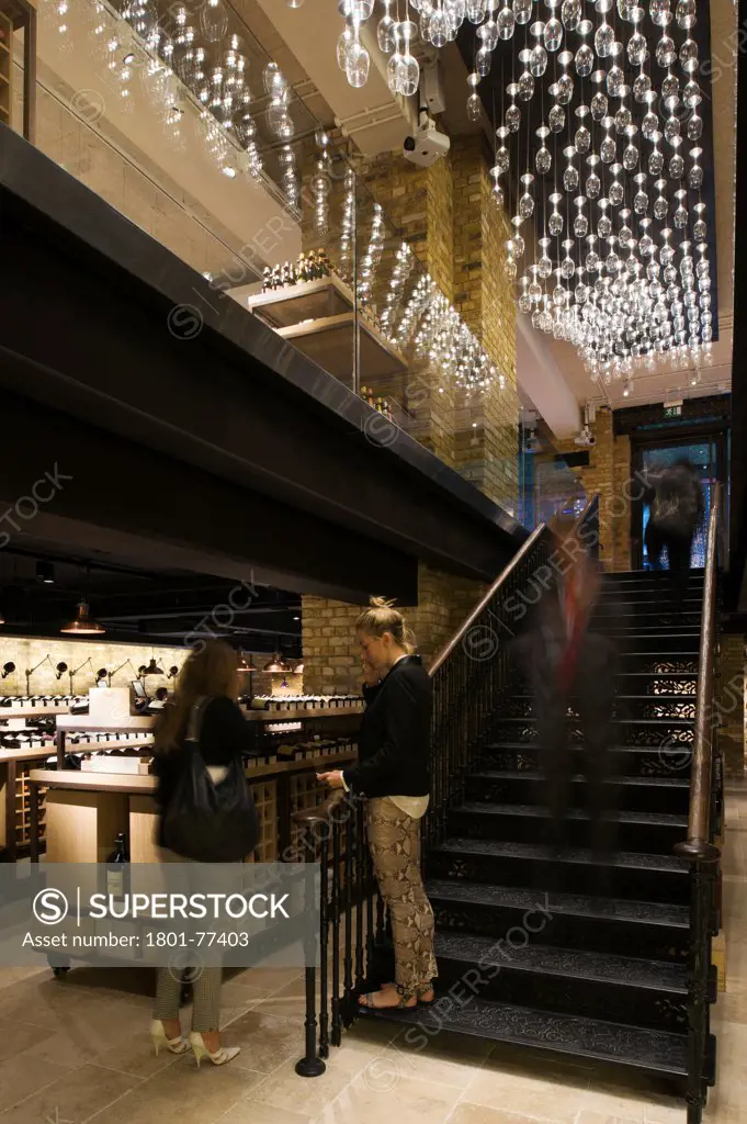 Hedonism Wines, Showroom, Europe, United Kingdom, , 2012, Universal Design Studio, Speirs + Major. Basement view with staircase.