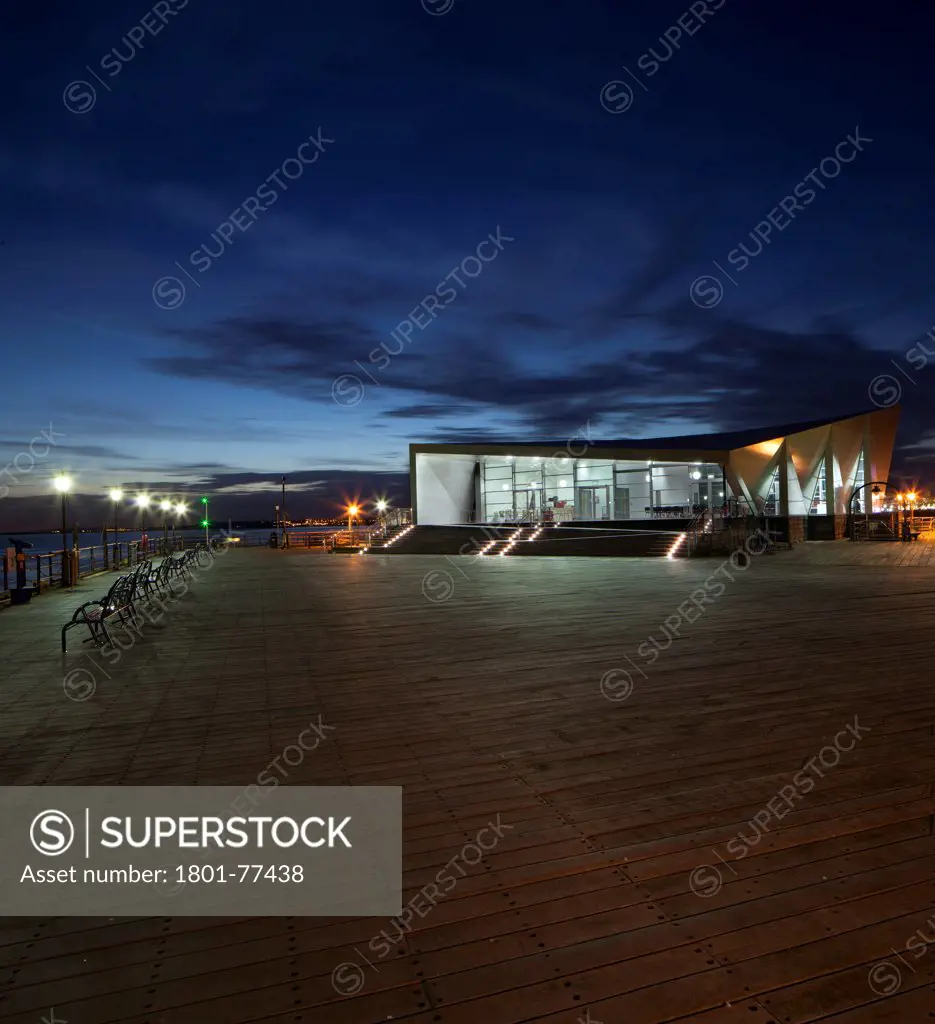Southend Pier Cultural Centre, Southend, United Kingdom. Architect: White Architects, 2012. Dusk shot of the main front elevation.