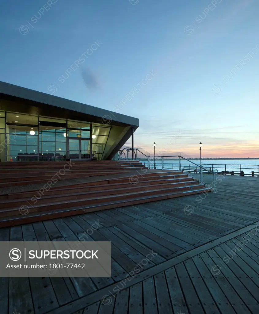 Southend Pier Cultural Centre, Southend, United Kingdom. Architect: White Architects, 2012. Sunrise view of the main facade.