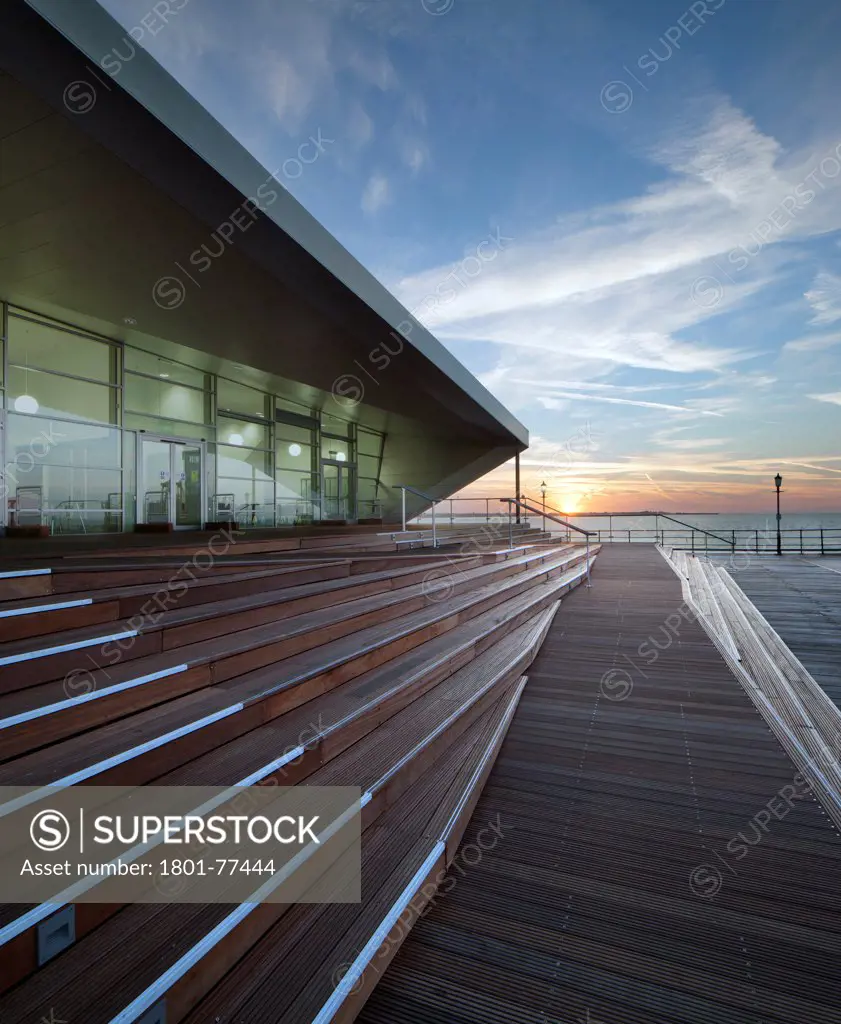 Southend Pier Cultural Centre, Southend, United Kingdom. Architect: White Architects, 2012. Sunrise view of the centre looking at the main entrance.