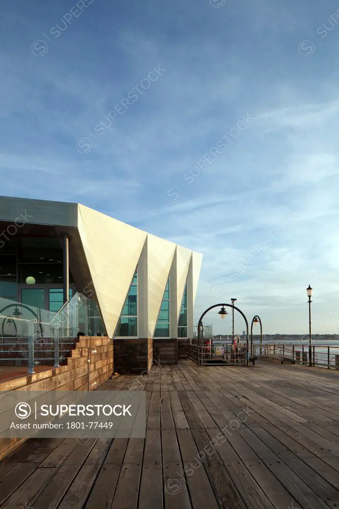 Southend Pier Cultural Centre, Southend, United Kingdom. Architect: White Architects, 2012. Side view at sunrise.