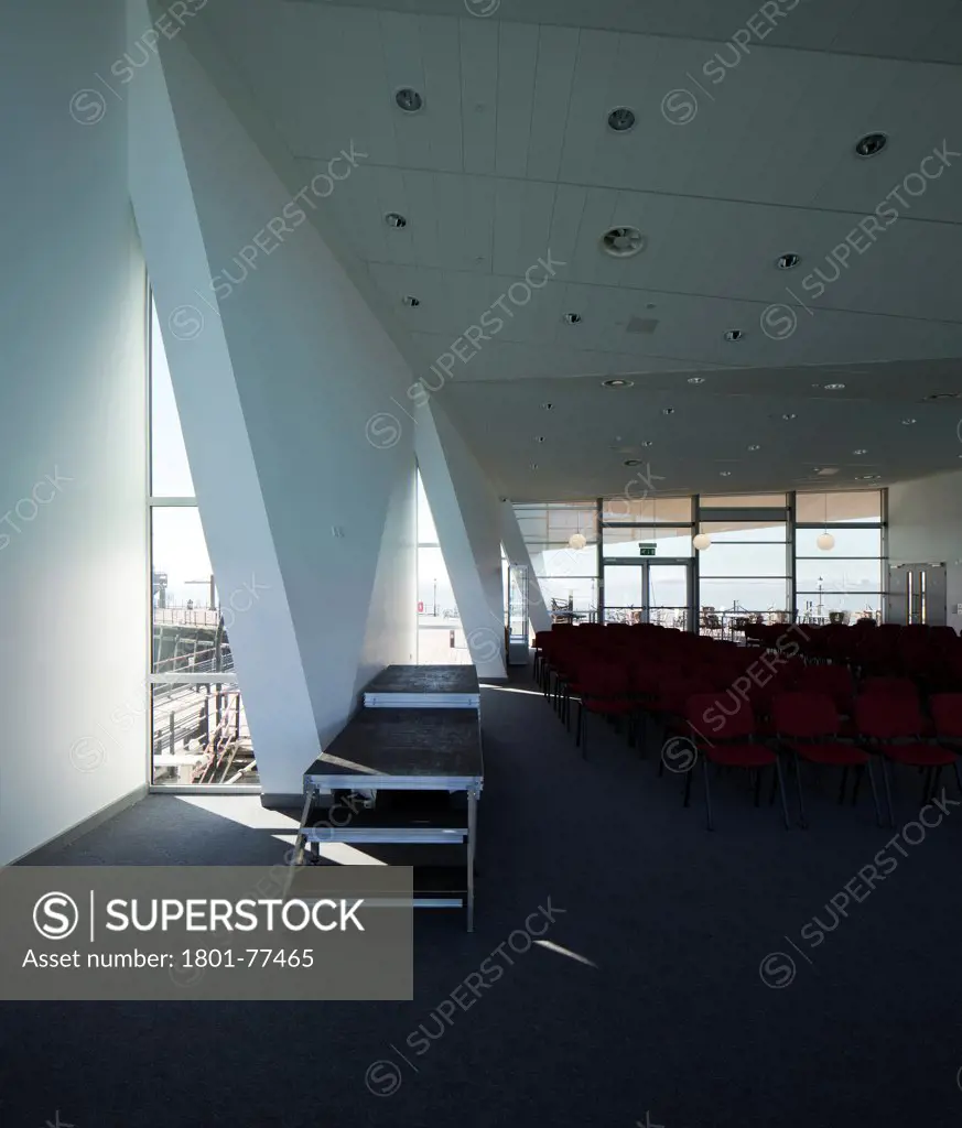 Southend Pier Cultural Centre, Southend, United Kingdom. Architect: White Architects, 2012. Main hall interior showing the triangular windows with light flooding in.