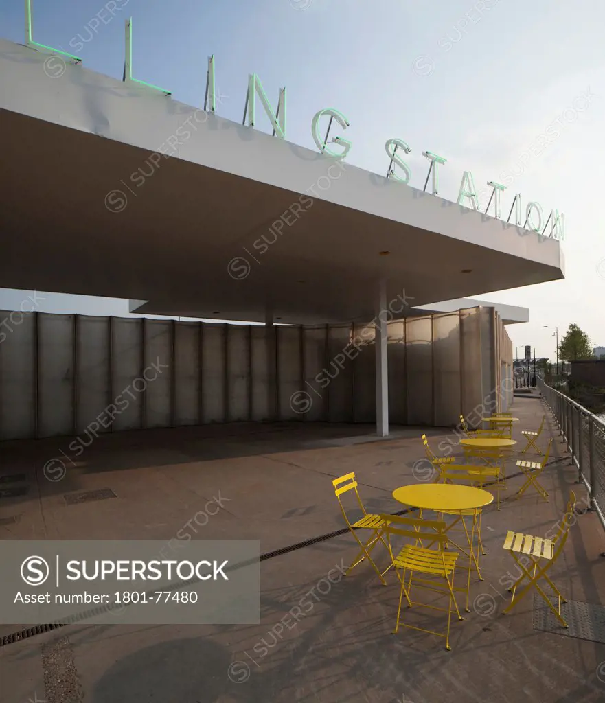 The Filling Station, London, United Kingdom. Architect: Carmody Groarke, 2012. Exterior dining and entertainment area.