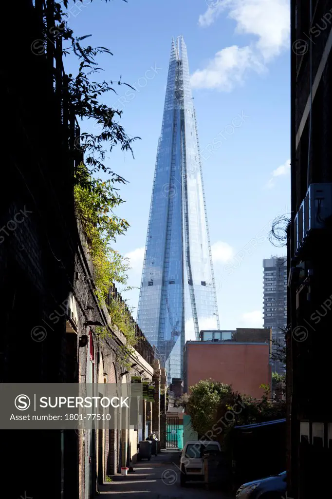 The Shard, London, United Kingdom. Architect: RENZO PIANO , 2012. View from side of railway viaduct approaching waterloo east.
