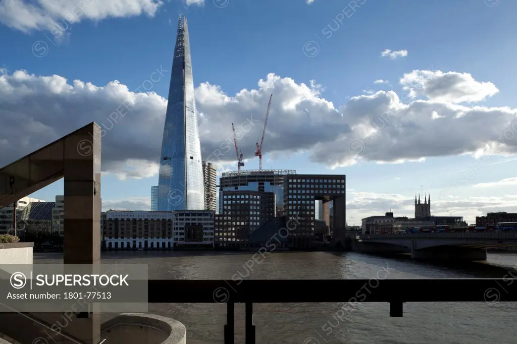 The Shard, London, United Kingdom. Architect: RENZO PIANO , 2012. Square view from footpath on north bank of thames.
