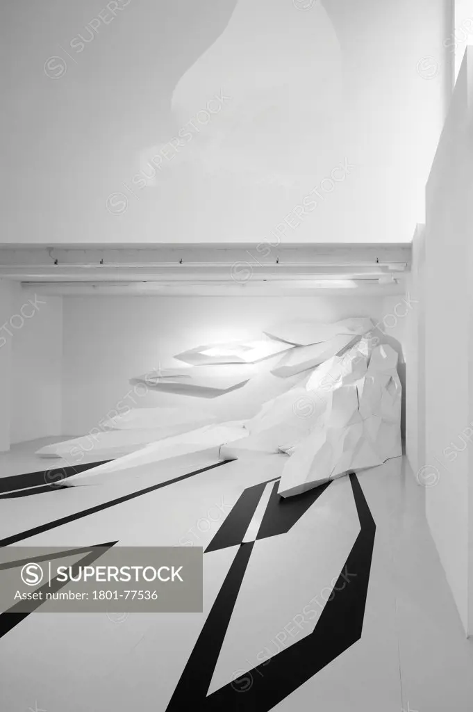 Zaha Hadid Design Gallery with Fudge Hair Pop-Up Salon, Art Installation, Europe, United Kingdom, , 2012, Zaha Hadid Architects. Basement level featuring Capsarc Relief and image projection.