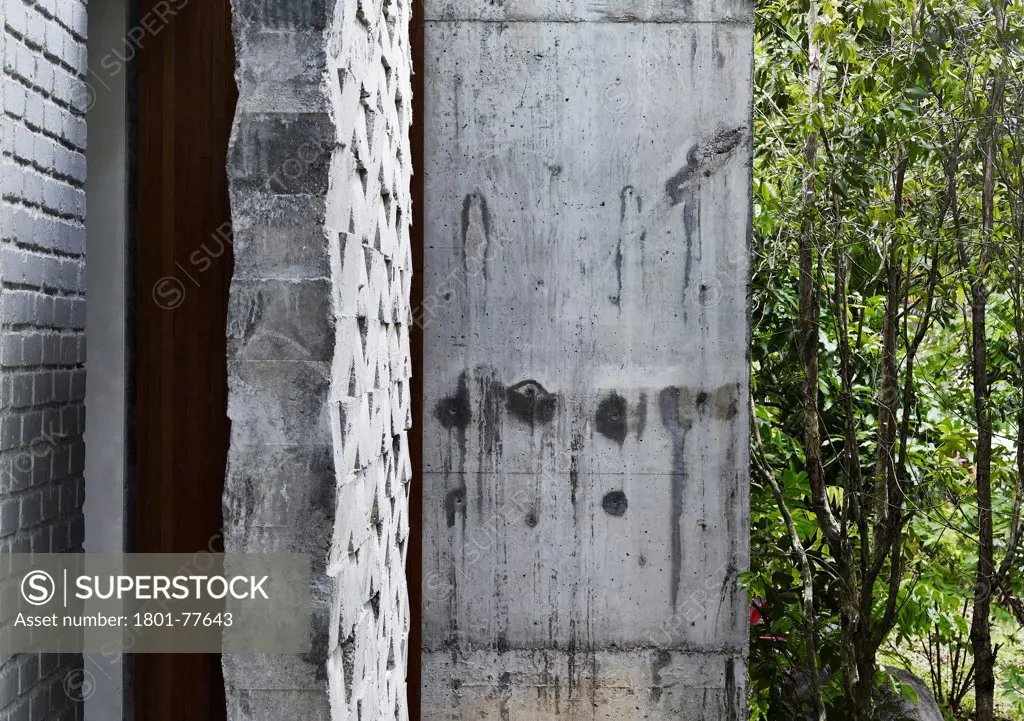 Dog Concrete House, Kuala Lumpur, Malaysia. Architect: Kevin Low, 2012. Pattern concrete facade detail.