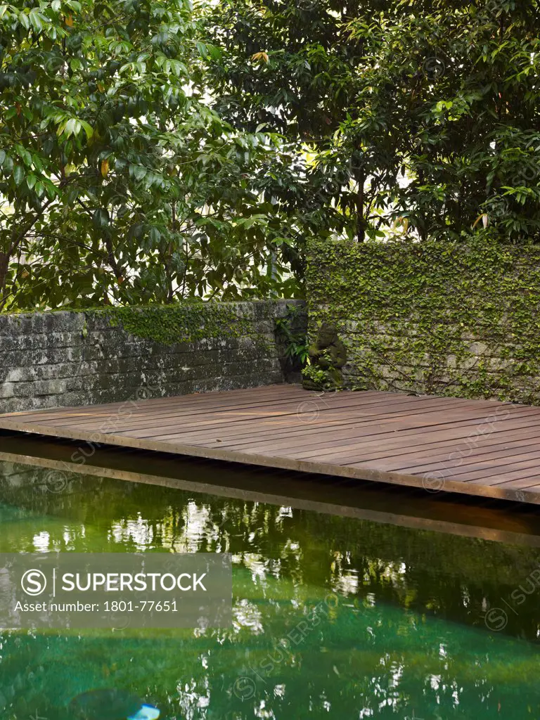 Dog Concrete House, Kuala Lumpur, Malaysia. Architect: Kevin Low, 2012. Swimming pool and decking.