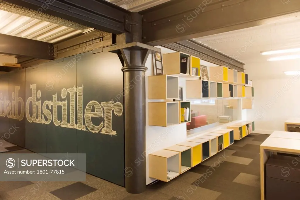 Distiller Records Office, Office, Europe, United Kingdom, , 2012, Milford / Martin LLP. Interior view of office with Distiller signage on door and office storage boxes on wall.