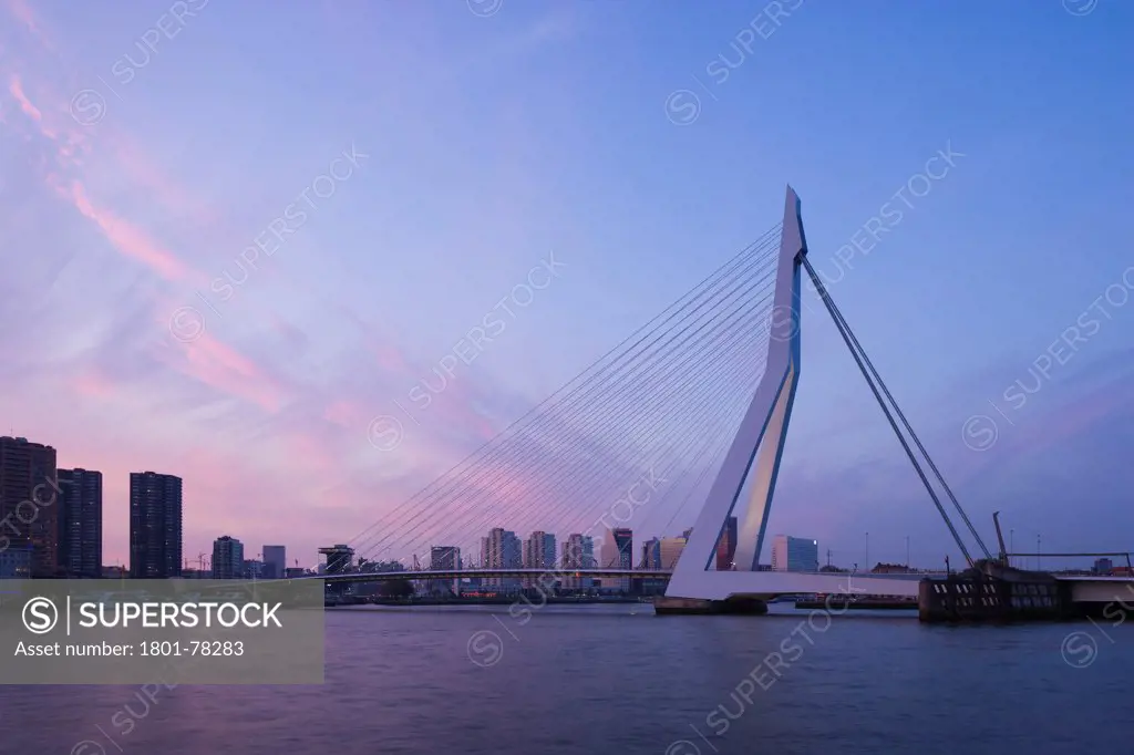 Erasmus Bridge, Rotterdam, Netherlands. Architect: Ben van Berkel, 1996. General dusk view.