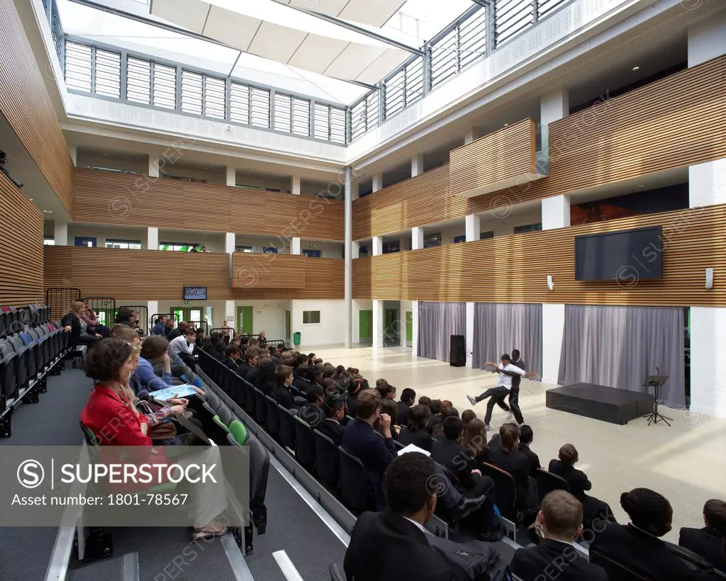 Oasis Academy, Coulsdon, United Kingdom. Architect: Sheppard Robson, 2011. Assembly Hall During Performance.