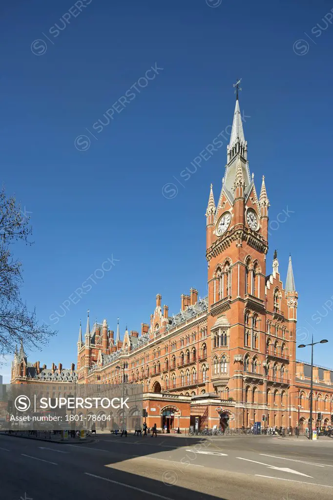St Pancras Hotel, London, United Kingdom. Architect: Sir Giles Gilbert Scott With Richard Griffiths Arc, 2011. Distant Corner View With Clock Tower And Euston Road.