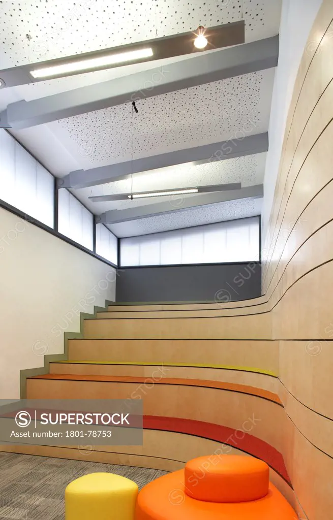 Cedars Youth And Community Centre, Harrow, United Kingdom. Architect: Lom Architecture And Design, 2012. Interior Play Area With Stair Seating.