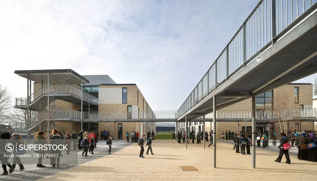 Thomas Tallis School, Greenwich, United Kingdom. Architect: John Mcaslan & Partners, 2012. Concourse Elevation With Building Links And Bridge.