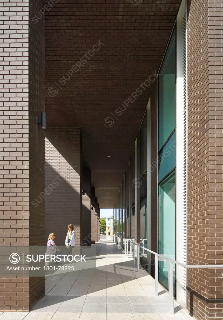 Postgraduate Statistics Centre And Learning Zone Building Lancaster University, Lancaster, United Kingdom. Architect: John Mcaslan & Partners, 2011. View Through Modern Arcade.