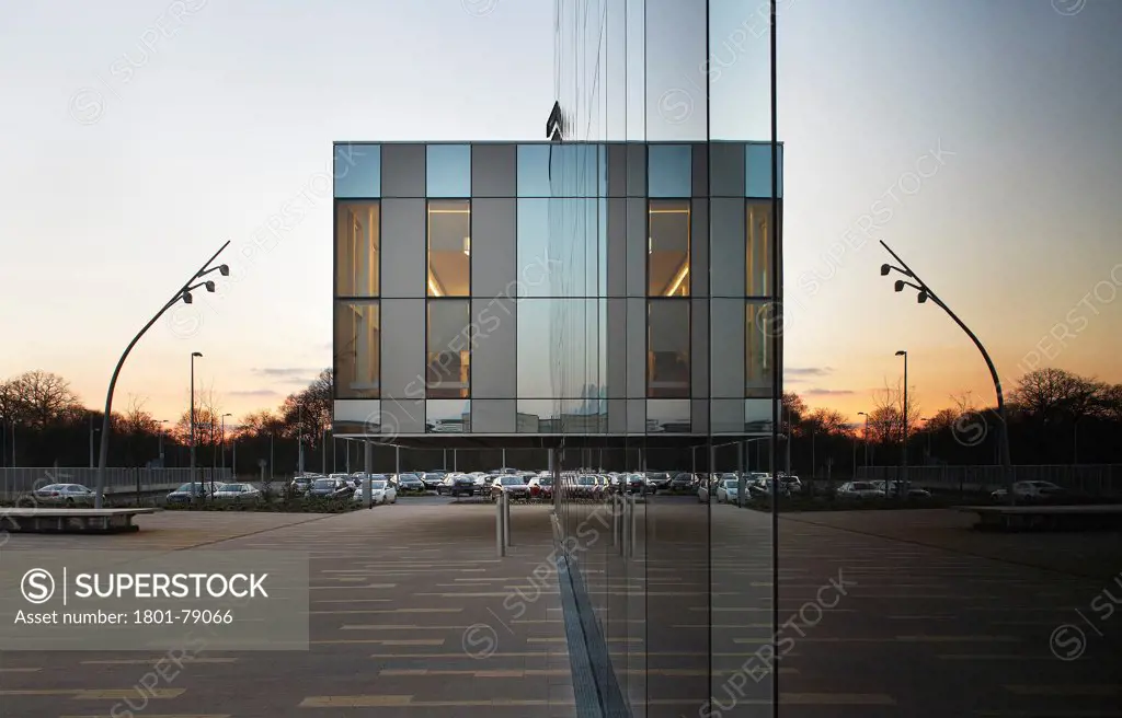 Corby Cube, Corby, United Kingdom. Architect: Hawkins Brown Architects Llp, 2010. Perspective Of Glazed South Facade With Cantilever Reading Room.