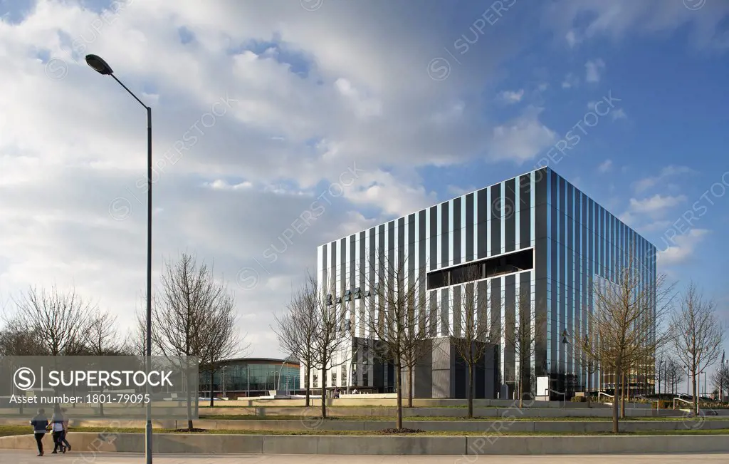 Corby Cube, Corby, United Kingdom. Architect: Hawkins Brown Architects Llp, 2010. South-East Corner Elevation In Context.