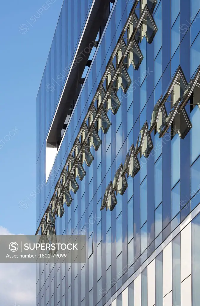 Corby Cube, Corby, United Kingdom. Architect: Hawkins Brown Architects Llp, 2010. Graphic Detail Of Glazed And Reflective Facade With Open Windows.