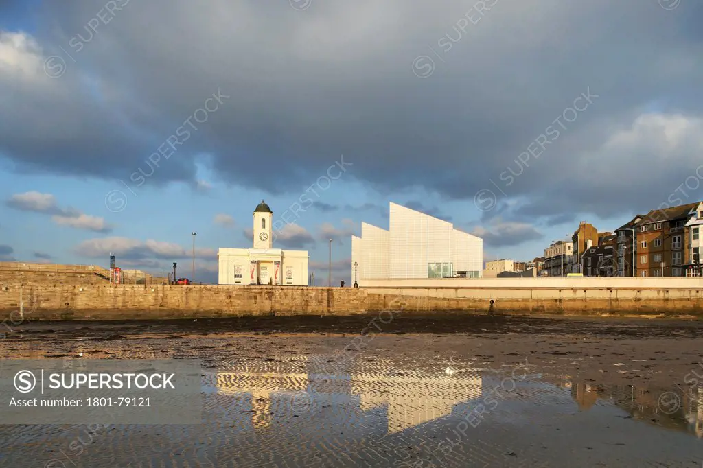 Turner Contemporary Gallery, Margate, United Kingdom. Architect: David Chipperfield Architects Ltd, 2011. Distant View Across Harbour At Low Tide.