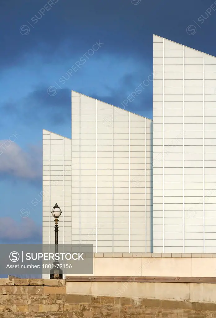 Turner Contemporary Gallery, Margate, United Kingdom. Architect: David Chipperfield Architects Ltd, 2011. Iconic Monopitch Roofs In Line Up With Pier Wall.