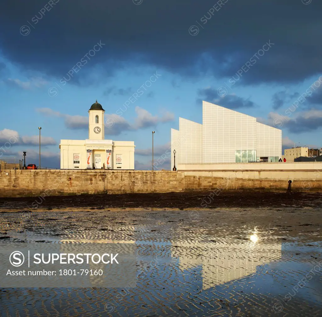 Turner Contemporary Gallery, Margate, United Kingdom. Architect: David Chipperfield Architects Ltd, 2011. View Across Harbour At Low Tide With Water Reflection.