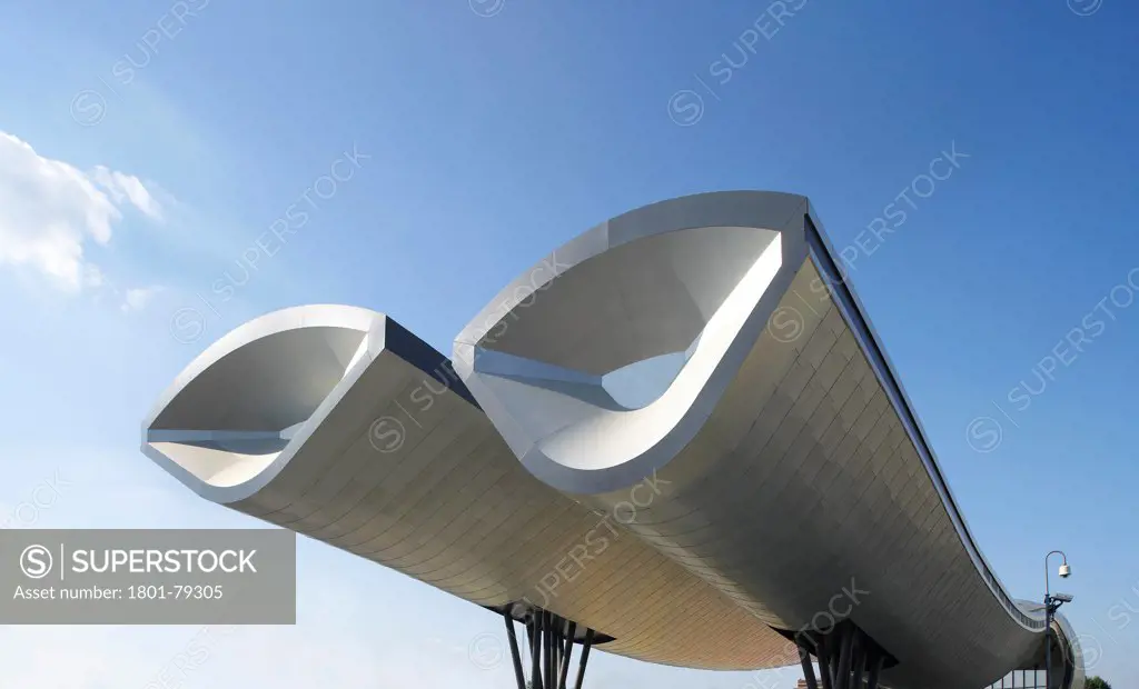 Slough Bus Station, Slough, United Kingdom. Architect: Bblur, 2011. Sculptural Detail Of Aluminium Shingle Cladding.