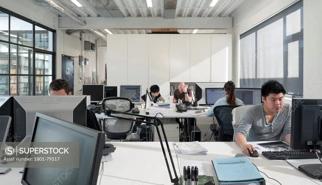 Moxon Studio, London, United Kingdom. Architect: Moxon, 2012. View Over Desks In Studio Space.