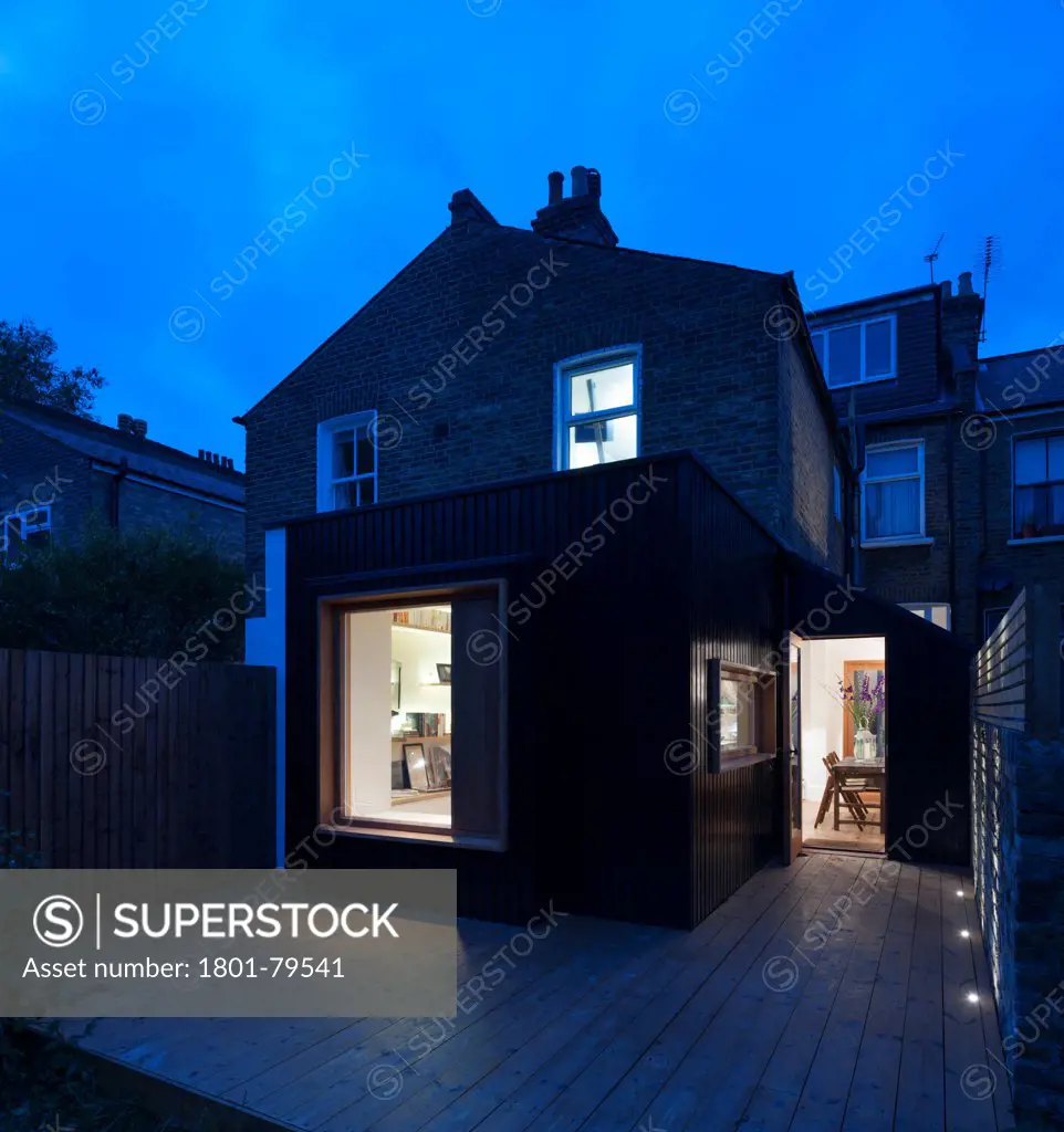 Victoria Road Private Home, London, United Kingdom. Architect: Ob-A, 2012. External View Of Rear Extension At Night.