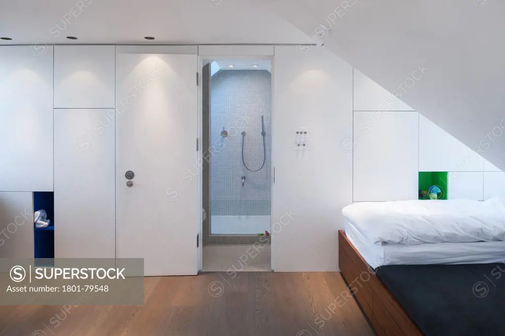 Highbury Loft Conversion, London, United Kingdom. Architect: Azman Architects, 2012. Elevation Of Cabinetry And Entrance To Shower Room.