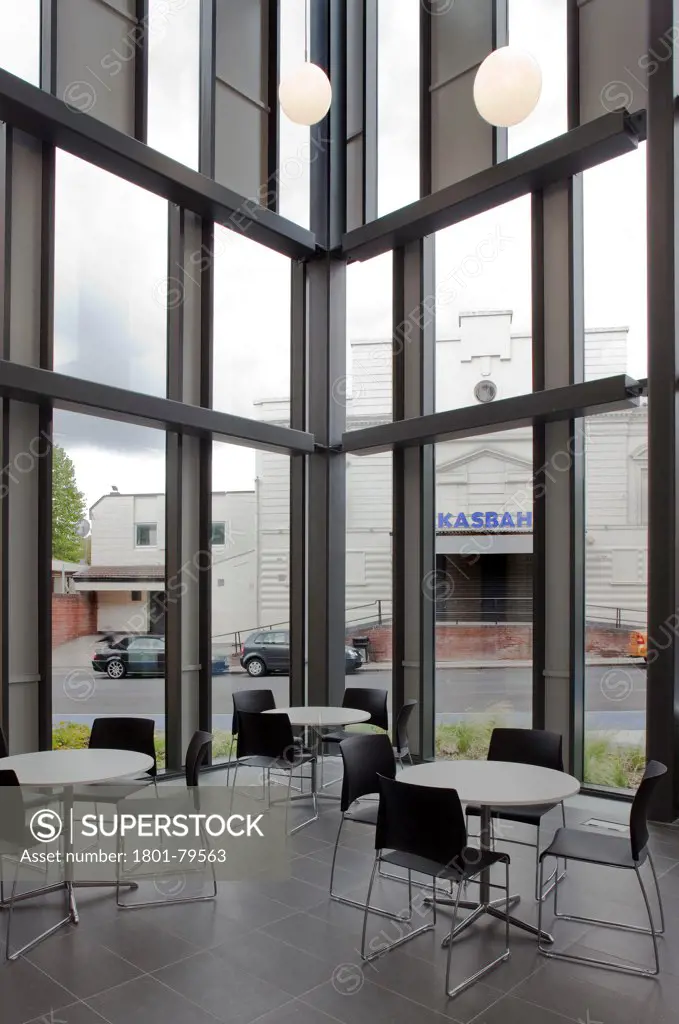 Sidney Stringer Academy, Coventry, Coventry, United Kingdom. Architect: Sheppard Robson , 2012. Chairs And Table In Corner Of School Entrance.