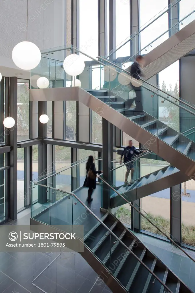 Sidney Stringer Academy, Coventry, Coventry, United Kingdom. Architect: Sheppard Robson , 2012. Students On Staircase.