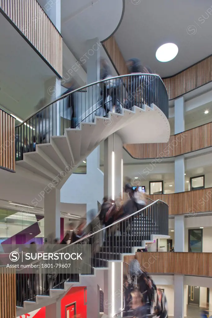Sidney Stringer Academy, Coventry, Coventry, United Kingdom. Architect: Sheppard Robson , 2012. Staircase With Students Circulating.