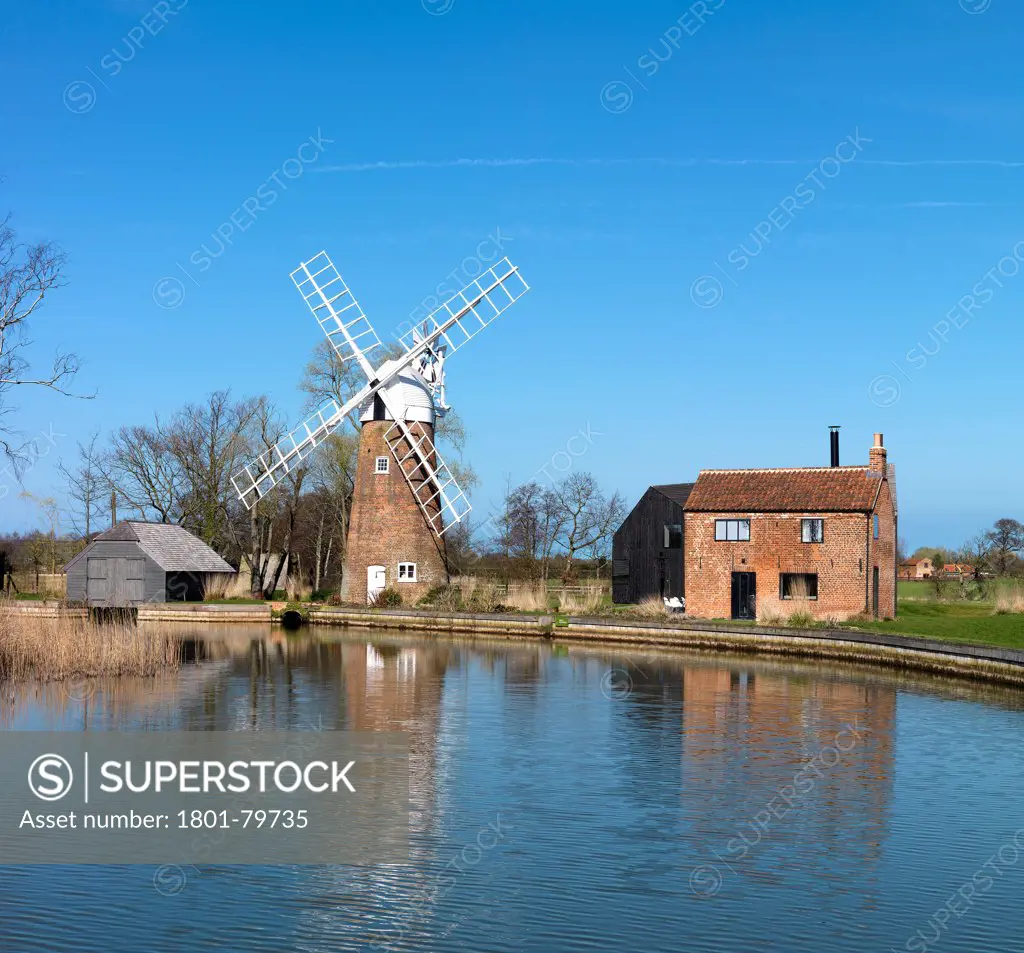 Hunsett Mill, Stalham, United Kingdom. Architect: Acme, 2010. View From Across The River Ant.