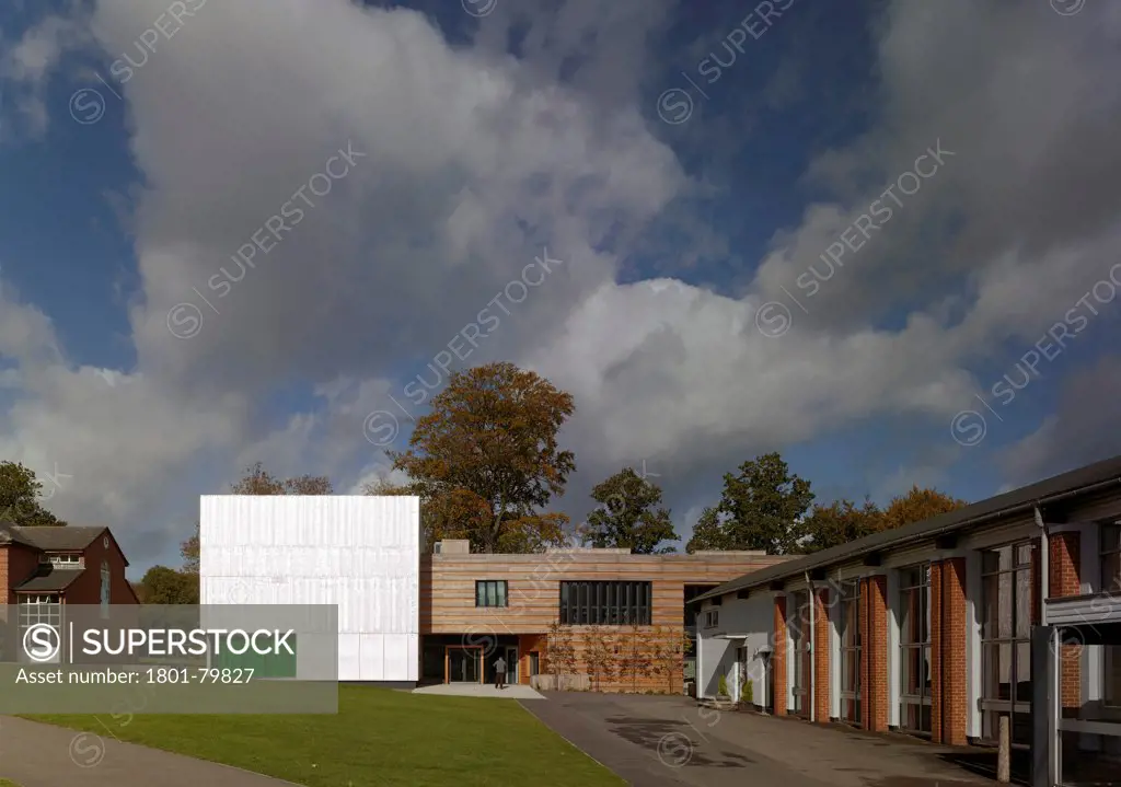 Pangbourne College, Pangbourne, United Kingdom. Architect: Mitchell Taylor Workshop, 2012. South Elevation Of The Music Centre In Context With 1960'S Buildings.
