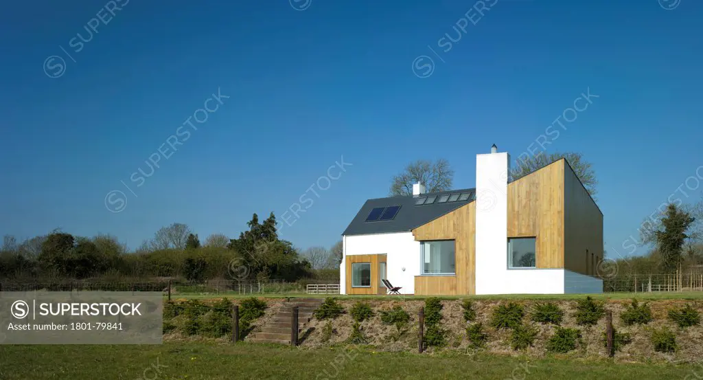 Woodfield House, Enfield, Ireland. Architect: Patrick Gilsenan Architect, 2011. Overview From Neighbouring Farm.