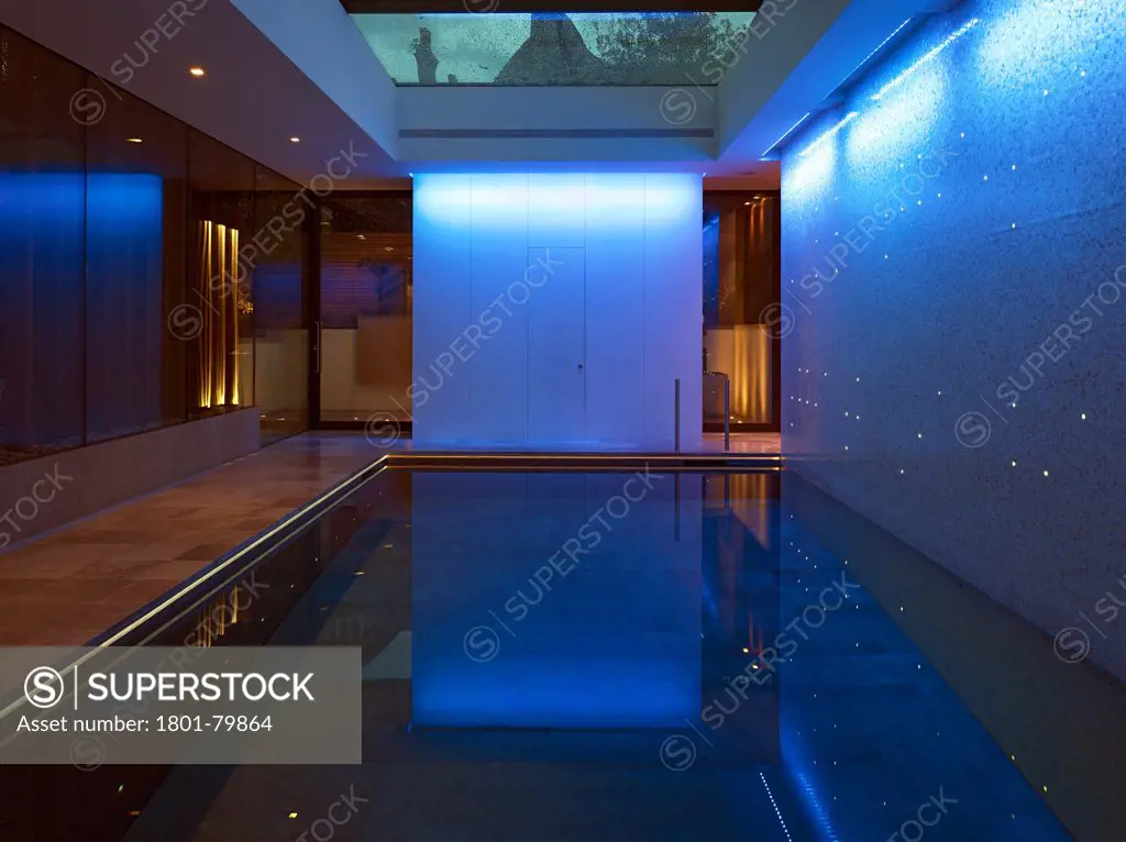 Private House, London, United Kingdom. Architect: Alan Higgs Architects, 2012. Pool Room At Night.
