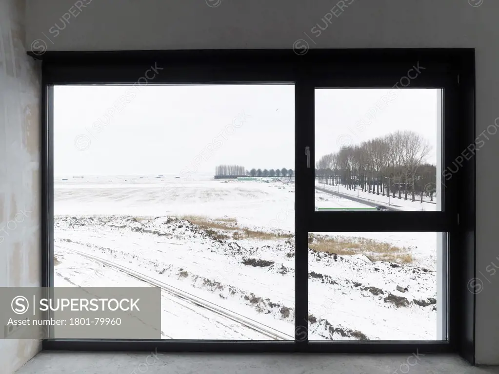 Housing Blaricummermeent, Blaricum, Netherlands. Architect: Casanova + Hernandez Architects, 2012. View Through To Winter Landscape.