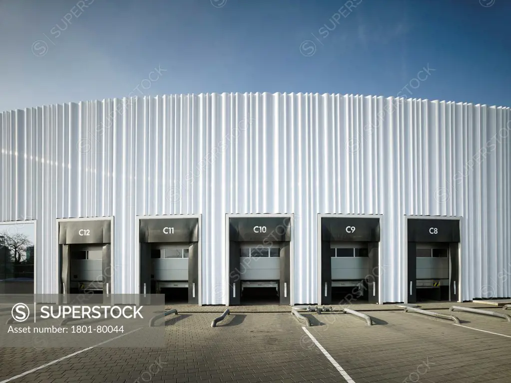Logistics Building At Vitra Campus, Weil Am Rhein, Germany. Architect: Sanaa, 2012. Building Facade With Individual Loading Docks.
