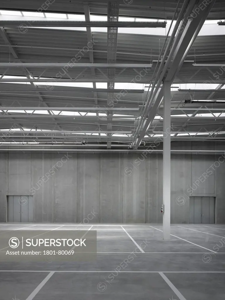 Logistics Building At Vitra Campus, Weil Am Rhein, Germany. Architect: Sanaa, 2012. Detail Of Empty Warehouse Space With Steel Frame Roof.