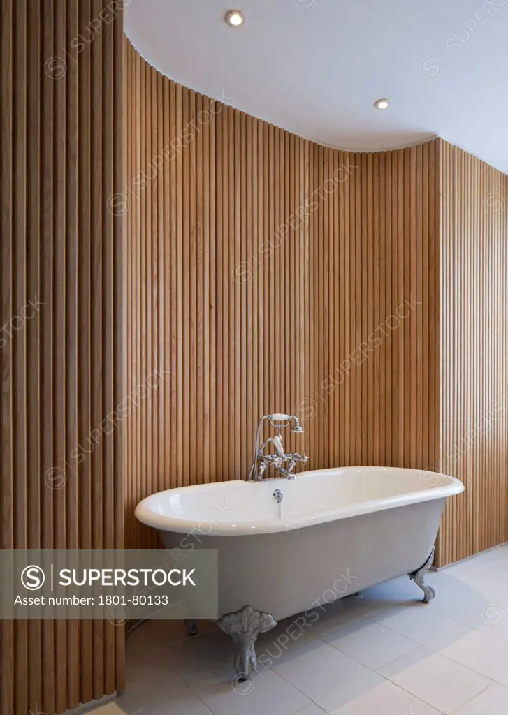 Barnsbury Road, London, United Kingdom. Architect: James Dunnett Architects, 2011. Bathroom With Curved Timber Cladding.