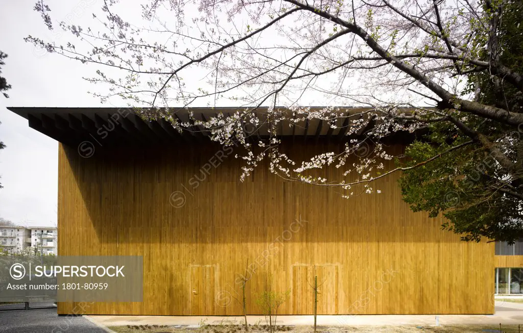 Teikyo University Elementary School, Tokyo, Japan. Architect: Kengo Kuma, 2012. Exterior View Showing Wooden Cladding.
