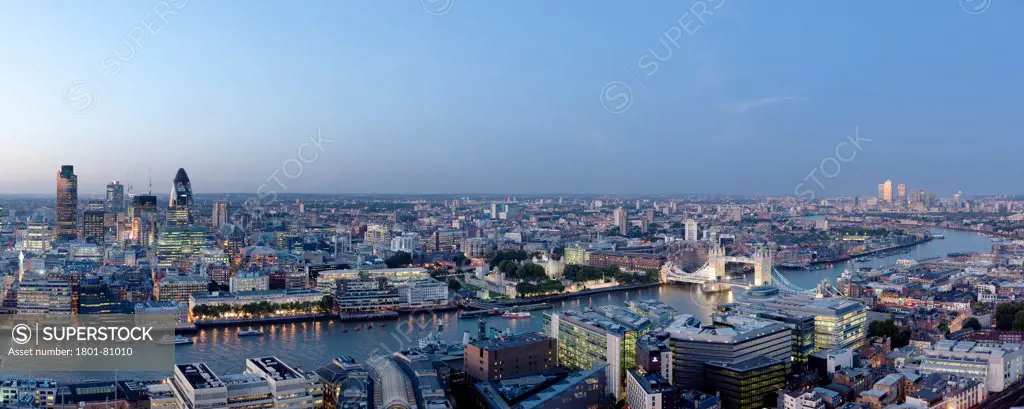 London Panoramas, London, United Kingdom. Architect: Not Applicable, 2013. Dusk Panorama With City Of London, Tower Bridge And Canary Wharf In The East.